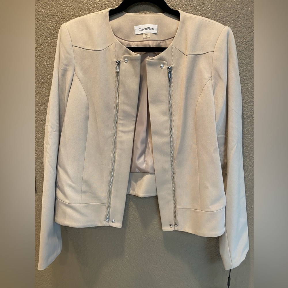 Calvin Klein ladies jacket with zipper embellishments in front.  NWT